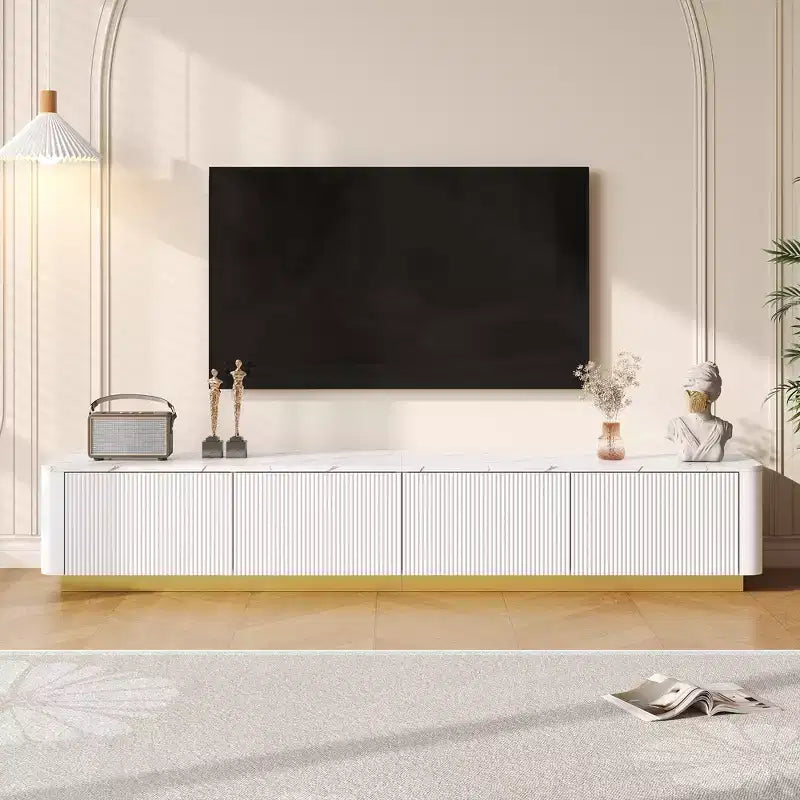 Mobile porta TV scanalato per TV da 85 pollici con base dorata, consolle multimediale moderna con 4 cassetti, centro di intrattenimento con design a profilo curvo